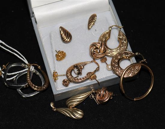 Ten pairs of assorted 9ct gold earrings and four single earrings.